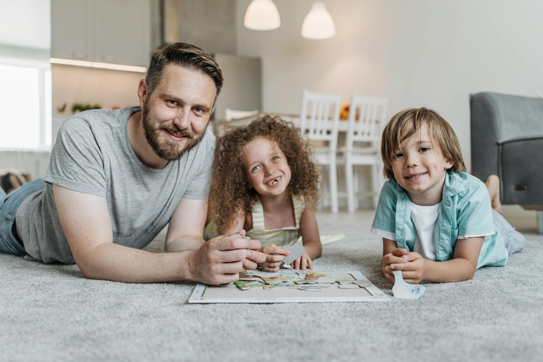 a man playing with his children